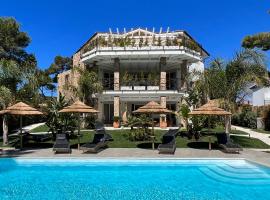 Suite Villa Aquamarina con Jacuzzi Riservata，位于皮诺港的公寓式酒店
