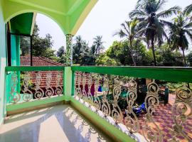 OYO 19112 Caphina Tourist Cottages，位于比纳里姆的酒店