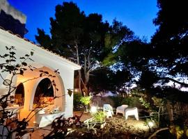 Antonia's Home - casa per le vacanze con giardino e veranda attrezzati，位于圣多米诺的海滩酒店