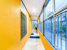 SPOT ON 60969 Hotel Vaishnavi Lodge，位于焦尔哈德的酒店