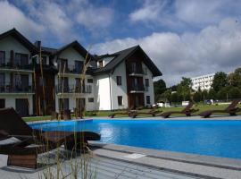 Perla Mare Apartamenty，位于库瑞尼卡慕斯卡的带按摩浴缸的酒店