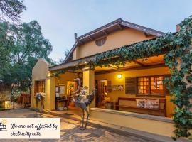 Riverside Guest Lodge，位于奥茨胡恩Oudtshoorn Golf Course附近的酒店