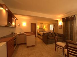 夏日时光 - 蒂诺公寓式酒店，位于艾西奥斯索蒂斯的公寓式酒店
