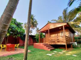 Tranquil Beach Resort，位于Harihareshwar的酒店