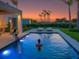 TAF Villas Beach Resort with Tesla，位于蒂加基的酒店