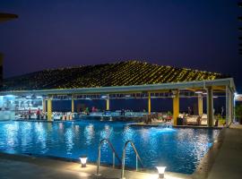 金海滩度假酒店，位于达曼机场 - NMB附近的酒店
