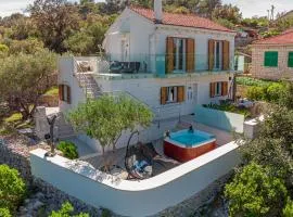 Uniquely designed Villa Ivana with outdoor Jacuzzi nearby the pebble Banje beach at the Island of Solta