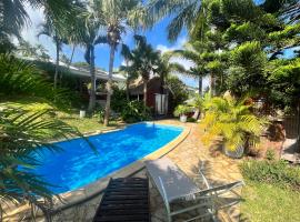 Bungalow indépendant dans jardin exotique , piscine，位于Fleurimont的度假短租房