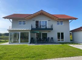 Neubau Grüner Wolpertinger Designwhg 106qm Barrierefrei，位于基姆湖畔布赖特布伦的自助式住宿