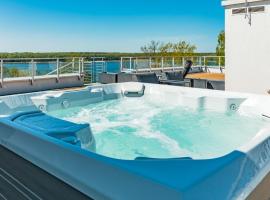 Apartamenty Stranda Residence nad jeziorem Mazury Holiday，位于吉日茨科的公寓