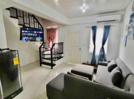 Full Aircon Camella House w/ wifi Netflix hotwater，位于武端市的酒店