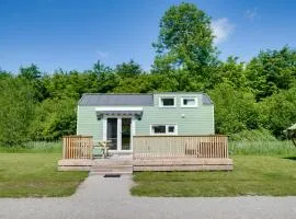 Green Tiny House with shared pool