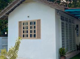 Kota Bharu RS Desa Roomstay，位于Kampong Haji Musa的木屋