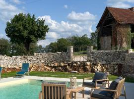 La ferme de la truffe chambres d hôtes，位于Cuzance的酒店