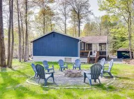 Deck and Community Perks Bright Pocono Lake Home!