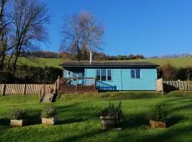 Badgers Den, a beautiful log cabin in a secluded valley close to the beach