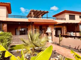 Stillvolle Villa mit Terrasse, Garten und Grill，位于拉哈雷斯的酒店