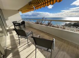 06AO - Superbe appartement avec vue mer exceptionnelle，位于卢贝新城的海滩酒店