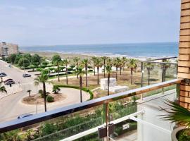 Apartamento a 100 metros de la playa con grande terraza y vistas al mar，位于代穆斯的酒店