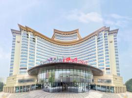 北京港澳中心瑞士酒店，位于北京北京工人体育馆附近的酒店