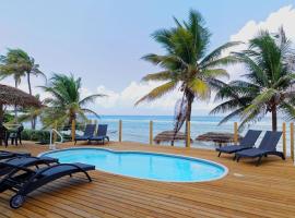 Snorkeler's Paradise - Beach Plum Villa，位于Hutland的度假屋