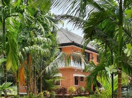 Joan's Homestay Near Kumarakom，位于Vaikom的酒店