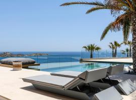 Villa Lilium II - Sanctuary overlooking Psarou Bay，位于萨鲁的酒店
