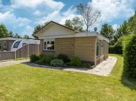 Holiday home in Baarland with garden