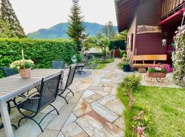 The Swiss Paradise 2 Apartment with Garden, Whirlpool, and Mountain Panorama，位于Wirzweli达伦维尔-韦尔兹韦里缆车附近的酒店