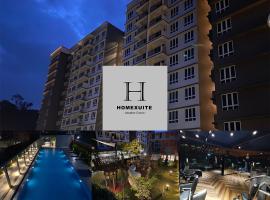 Homexuite Vacation @ Sri Indah，位于山打根的带按摩浴缸的酒店