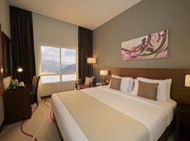 Action Hotel Ras Al Khaimah，位于拉斯阿尔卡麦的酒店