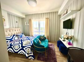 Lovely Studio Condominiums at Mesavirre Garden Residences Bacolod，位于巴科洛德的带按摩浴缸的酒店