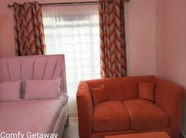 Comfy Getaway STUDIO apartment near JKIA & SGR with KING BED, WIFI, NETFLIX and SECURE PARKING，位于思由基茅的酒店