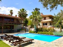 George's gorgeous house Anavysos，位于阿纳维索斯的酒店