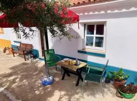 Casa Anneli - relaxing under the olive tree