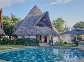 Cosy Cottage Marine Park at Malindi beach，位于马林迪的海滩短租房