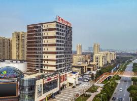 维也纳国际酒店江苏无锡惠山堰桥地铁站店，位于无锡的酒店