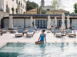 QC Grand Hotel Villa Arzaga Garda Spa & Golf，位于卡拉瓦吉斯德拉海滨的酒店