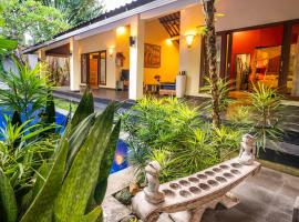 Villa Agni - Newly renovated tropical villa in peaceful location a short walk from the best of Seminyak，位于塞米亚克的酒店