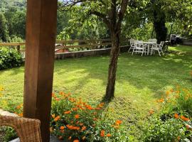 Casa adosada con gran jardín en Osséja，位于奥塞雅的酒店