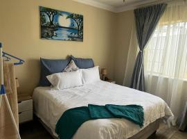 Phindulo Bed and Breakfast - No Loadshedding, Smart TVs & unlimited free fibre wifi，位于克鲁格斯多普露帕斯夫勒火车站附近的酒店