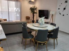 Appartement 3 chambres + séjour à Alger Hydra，位于Hydra的带停车场的酒店