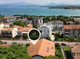 Appartamento 2, Villa Magnolia, 64mq, Lago di Garda，位于佩斯基耶拉德加达的乡村别墅