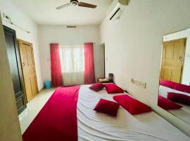 Rose Garden home stay Thrissur，位于德里久尔的酒店