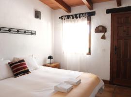 The Wild Olive Andalucía Palma Guestroom，位于卡萨雷斯的农家乐