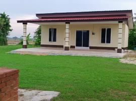 Heal Inn Roomstay- Islamic Guest，位于加央的酒店