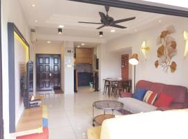 斯里萨雅珊瑚度假公寓，位于峇都丁宜的带泳池的酒店