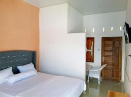 RedDoorz @ Sihole Paradise Inn Parbaba，位于Sinapuran的酒店