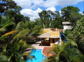 Casa da Arvore Apartamentos Pousada，位于阿拉亚尔达茹达Ilha dos Aquarios附近的酒店