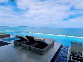 Seaview Beachfront Skypool Rooftop Copacabana Jomtien Condo，位于乔木提恩海滩的酒店